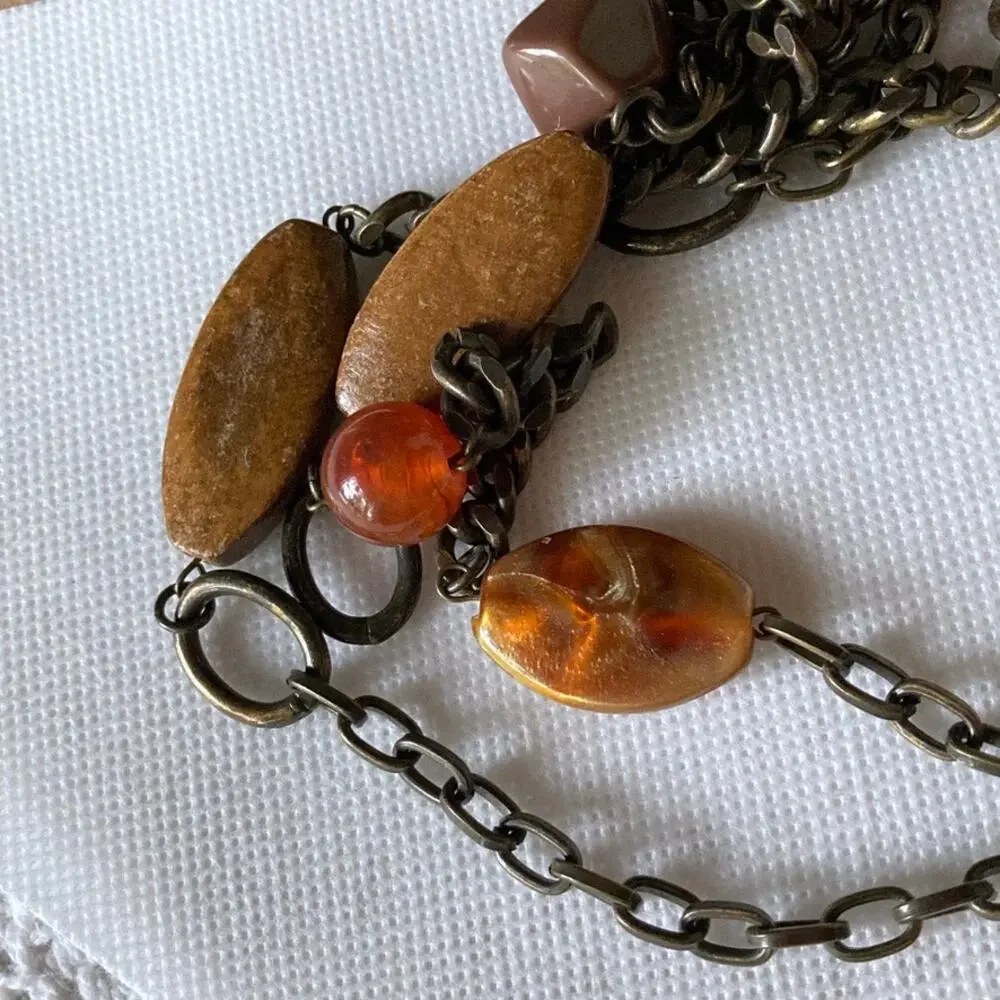 Brass- and earth-tone chunky statement necklace
